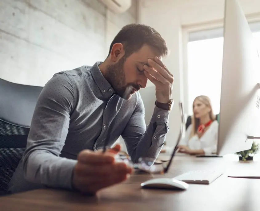 Stress Management Counselling Northern Rivers NSW - Man Stressed At Desk